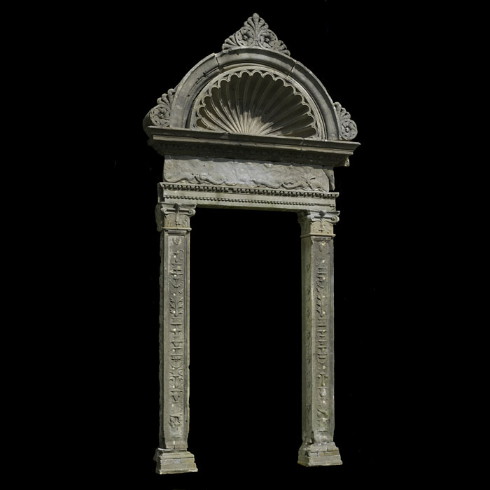 A Venetian Pietra Serena stone door casement
