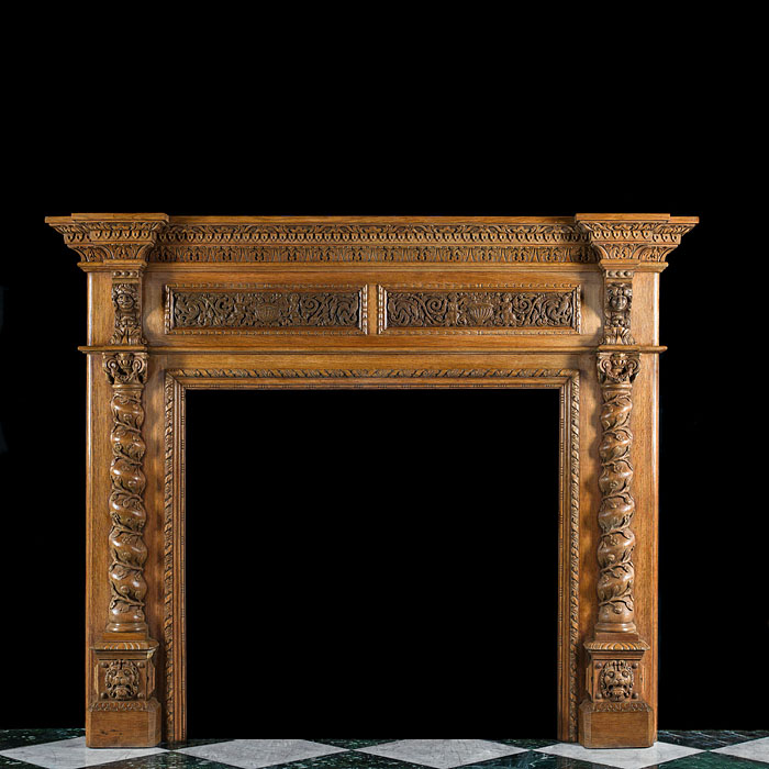 A Renaissance Style Light Oak Fireplace 

