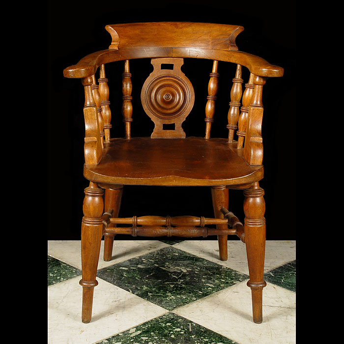 A Victorian Teak Captains Chair 
