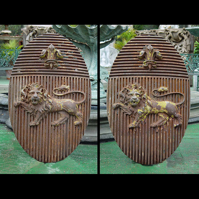 A Pair of Large Cast Iron Armorial Crests