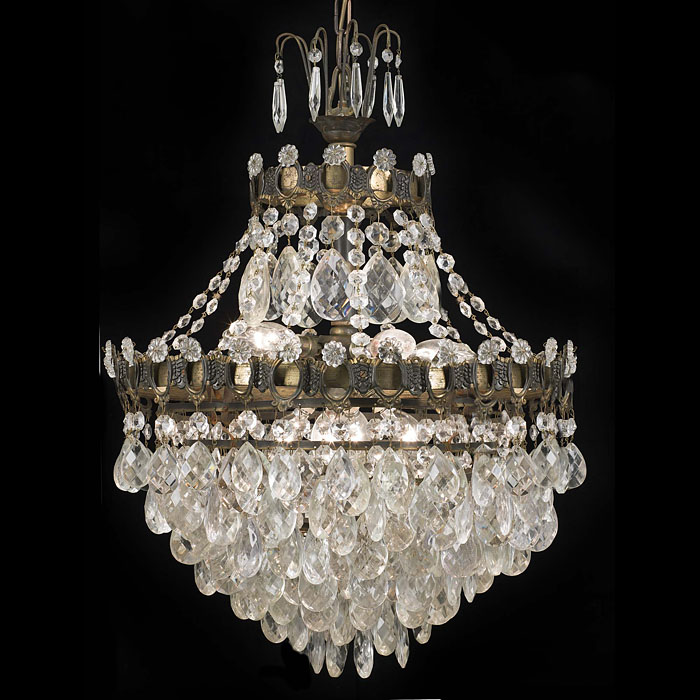  A large Edwardian glass and brass bag chandelier   