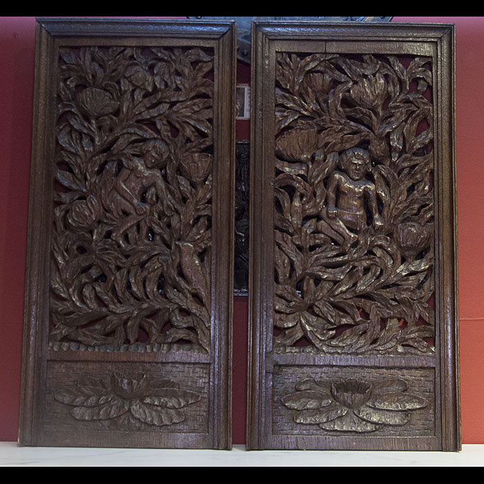 A pair of profusely carved oak panels