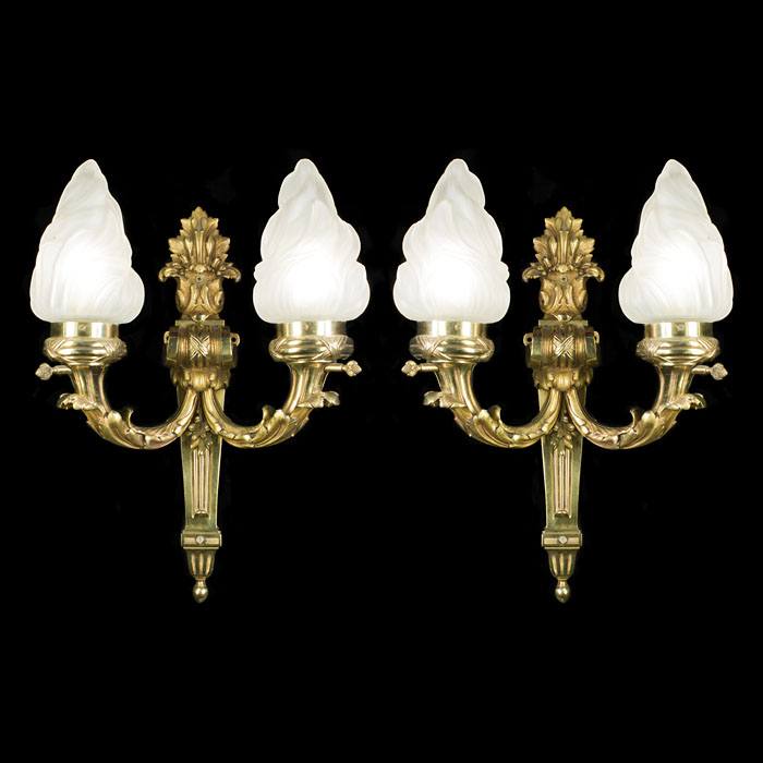 A large pair of Baroque style wall lights
