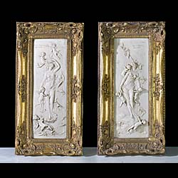 A pair of 19th century marble resin plaques