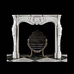 A Small French Rococo Style Marble Fireplace