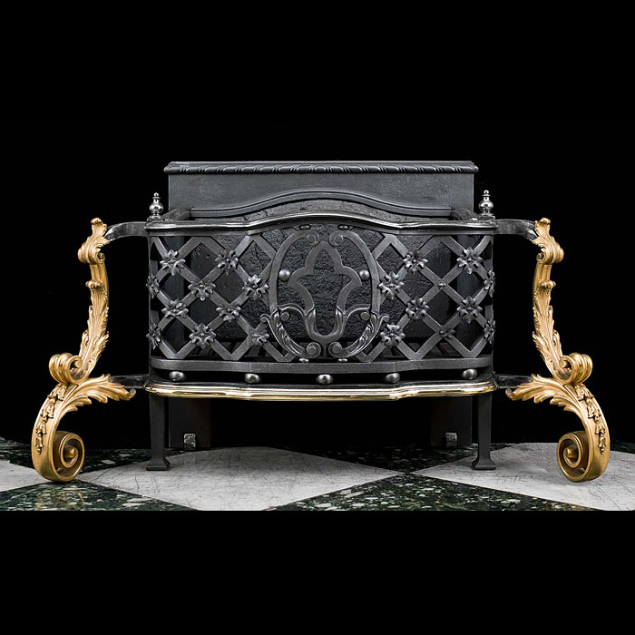 A large Rococo style cast iron and ormolu fire basket 