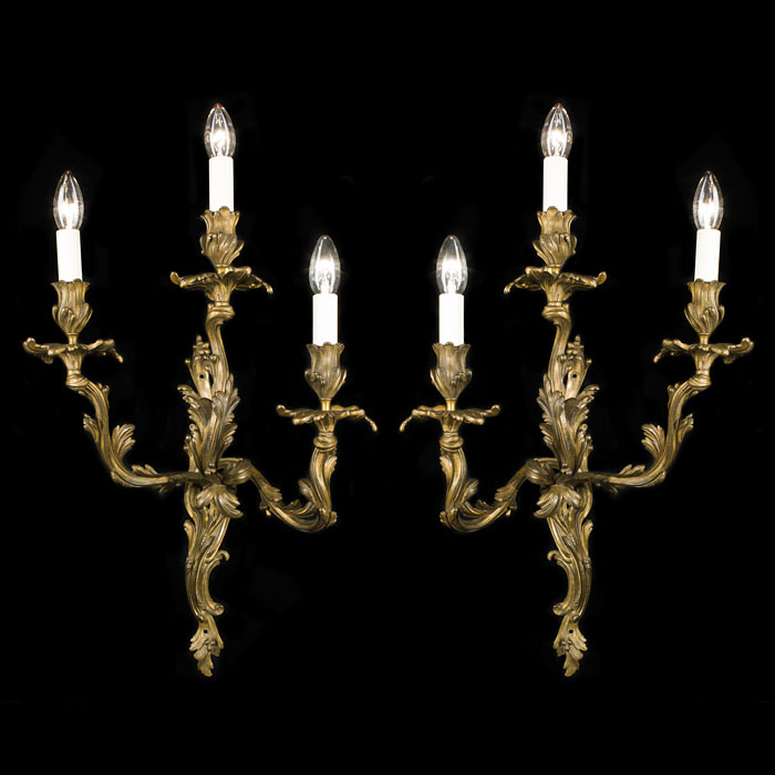 A large pair of Rococo style wall lights