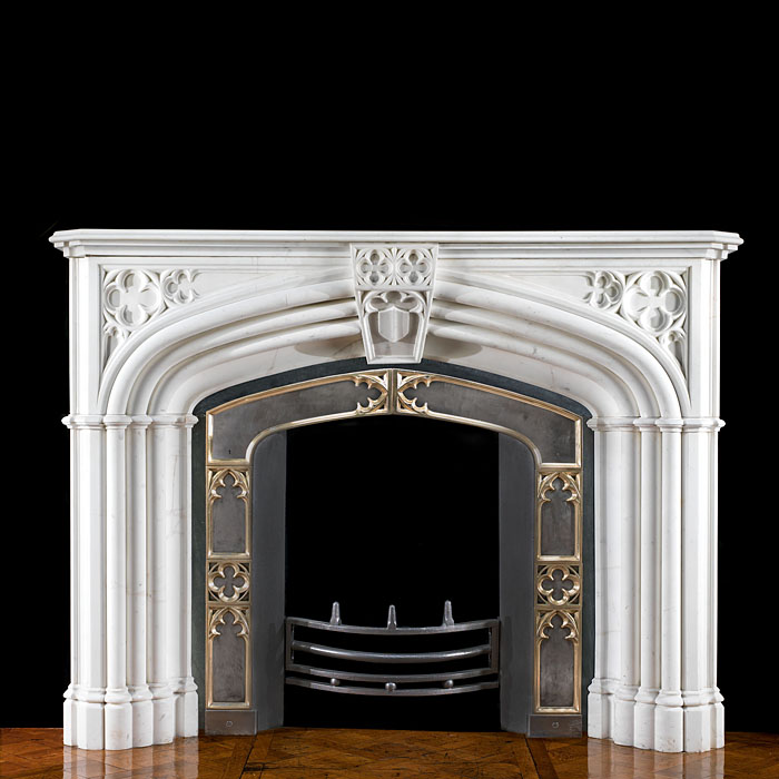 A Gothic Revival Statuary Marble Fireplace 