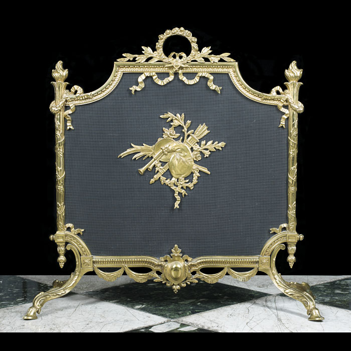 A French brass and mesh fireplace screen