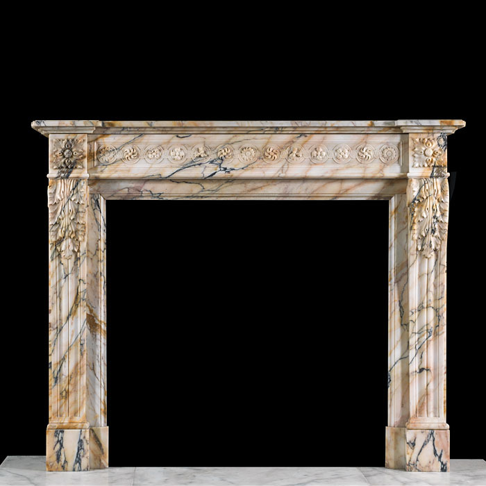 A Pavonazzo Marble chimneypiece