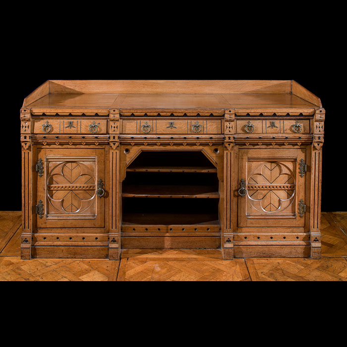 A Gothic Revival inlaid oak sideboard
