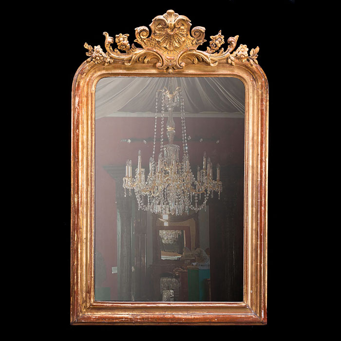A giltwood Rococo style wall mirror 
