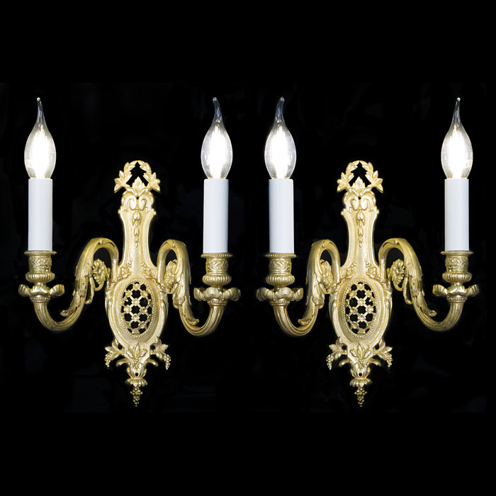 A French Empire pair of ormolu wall lights