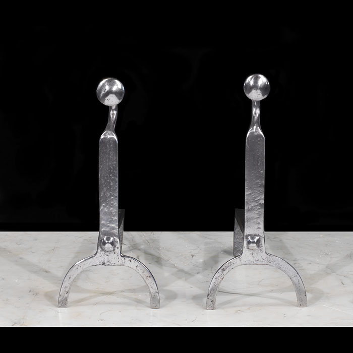 Pair of small polished wrought iron andirons