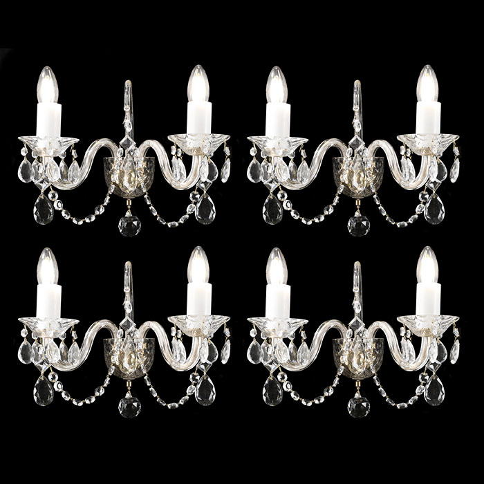 A Set of Four Cut Glass Wall Lights 