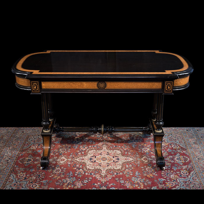 A Fine Edwards and Roberts Writing Table in Amboyna and Harewood 