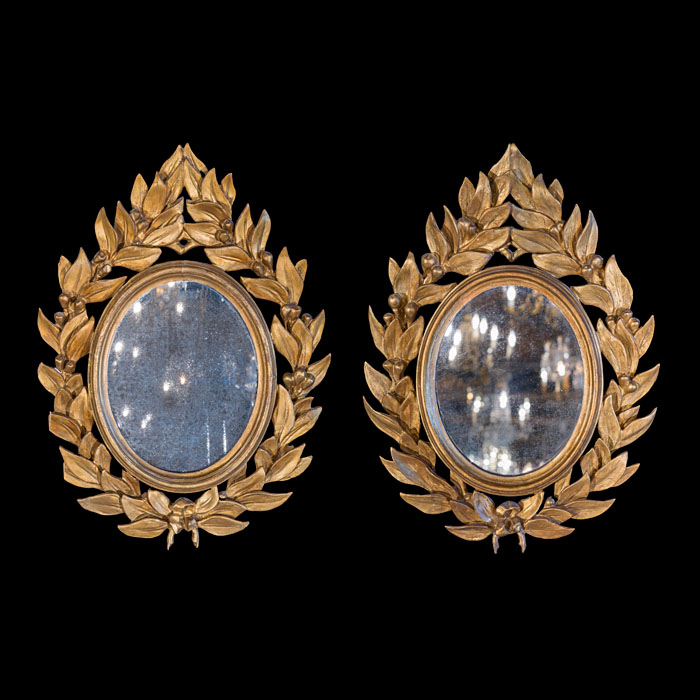 A Fine Pair of Laurel Leaf Giltwood Wall Mirrors 