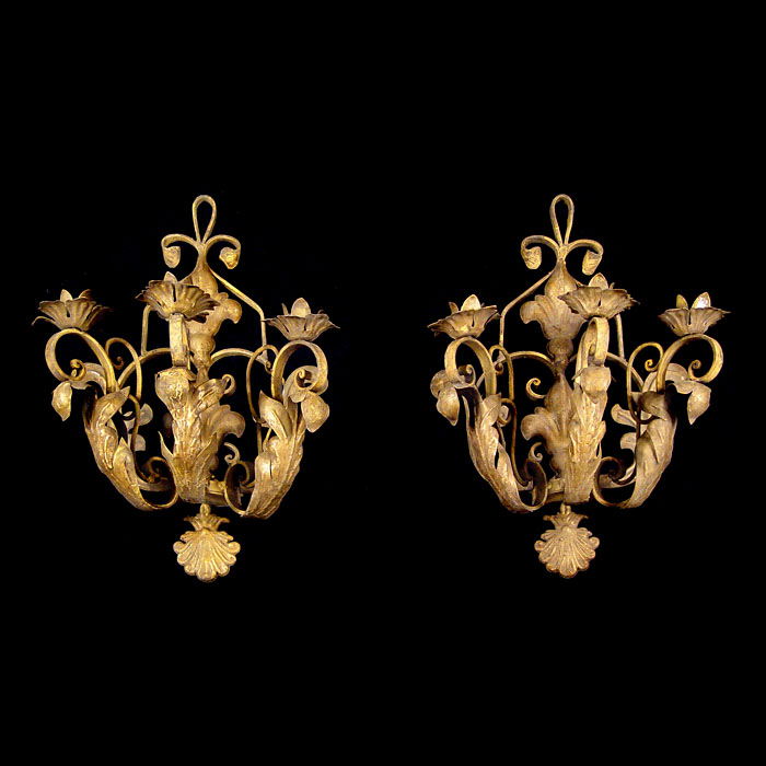 A Baroque Style Pair of Repousse Wall Lights