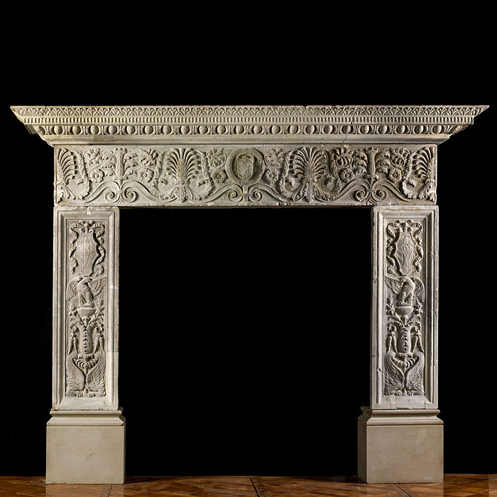 An Italian Renaissance style stone fireplace mantgel