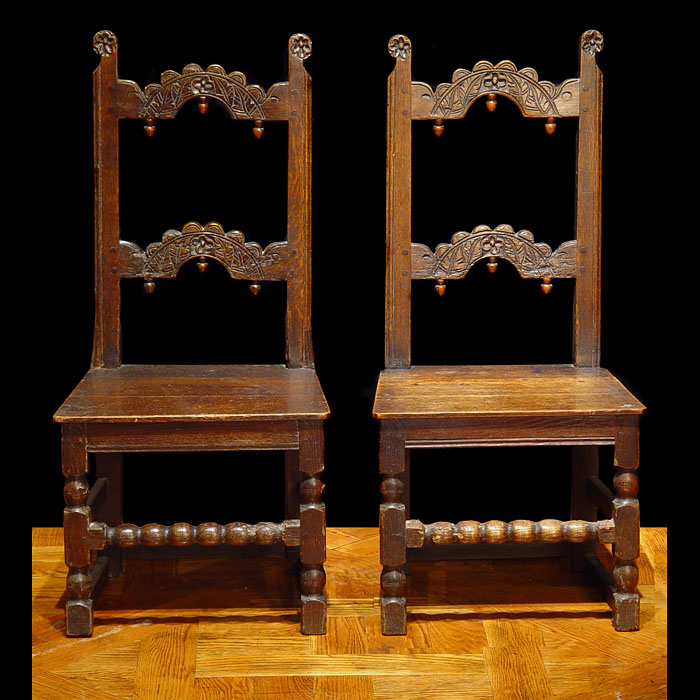 A Rare Pair of 17th Century Oak Hall Chairs
