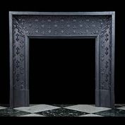 11450: A LARGE CAST IRON LOUIS XVI FIREPLACE INSERT, of concave format with floral decoration. French 19th century.

  Link to: Antique Fire grates and Register grates.

