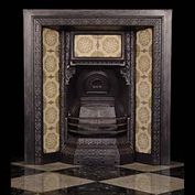 11570: A GOOD QUALITY VICTORIAN CAST IRON TILED REGISTER GRATE / insert, with attractive patterns cast into the iron nicely sombined with delicately patterned ' cracklure ' tiles. English late 19th century.
