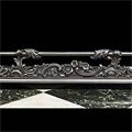 A Rococo style steel and cast iron antique fireplace fender.